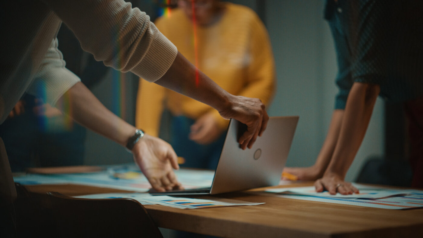 People reviewing research results at a tabl